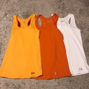 THREE under armour tank tops in NEW condition